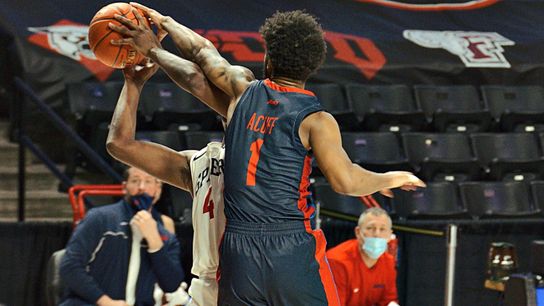 Dukes' defense sparks comeback in 67-62 win over Richmond taken on the South Side (Duquesne)